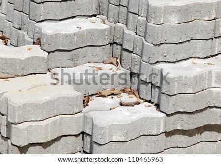 Pile of bricks for building construction in front of the way