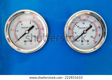 Dial pressure gauge for high pressure pump in the industry plant.