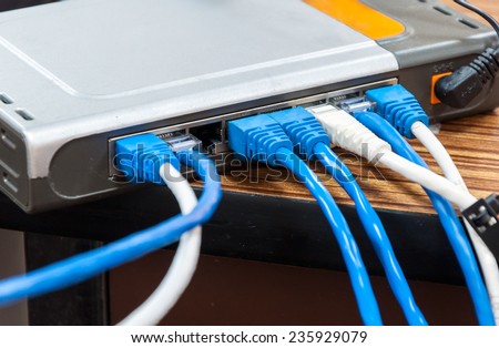 Variety of lan cable behind the modern router
