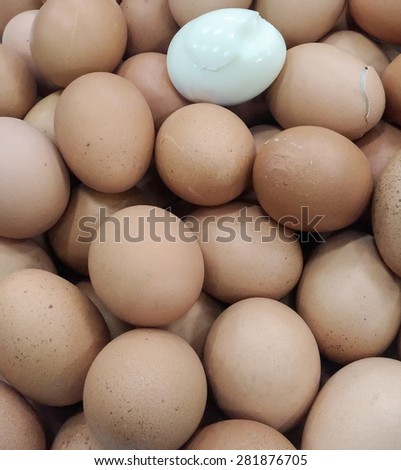 Boiled eggs pile in the tray of supermarket.