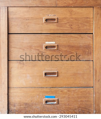 Wooden filing cabinet in the home office.