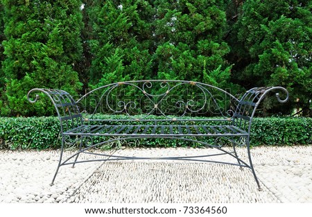 Classic style of black metal sofa in the Spanish garden.