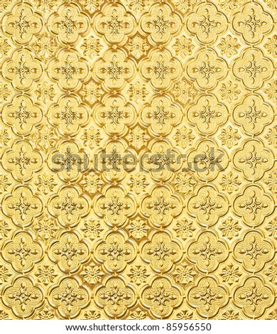 Golden floral background in the church of royal palace,Thailand