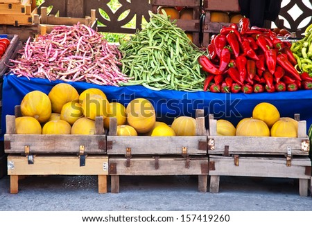 Fresh Organic Fruits and Vegetables At A Street Market Juan Canary Melon, Red and Green Pepper, (Red Mullet) Kidney and Green Beans