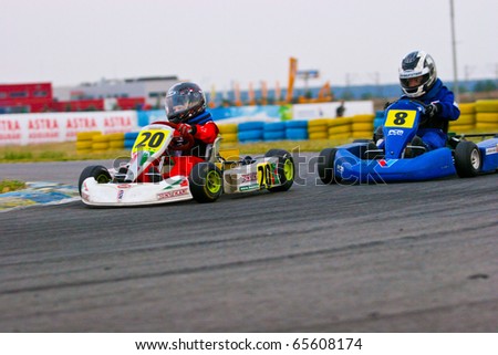 BUCHAREST, ROMANIA - SEPT. 25: Moldovan Florinel competing in National Karting Championship on September 25, 2010 in Bucharest, Romania