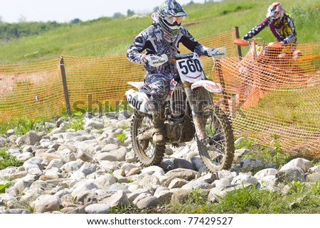 stock-photo-ciolpani-romania-may-popescu-ciprian-gabriel-number-participates-in-the-motocross-77429527.jpg