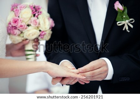 Wedding couple hands close-up during wedding ceremony