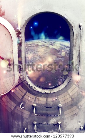 Planet Earth through the window of spaceship.Elements of this image furnished by NASA.