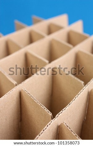 Geometry abstract shape of cardboard paper. isolated on blue background