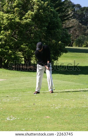 golfer doing a practice swing