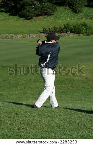 end of a golf swing