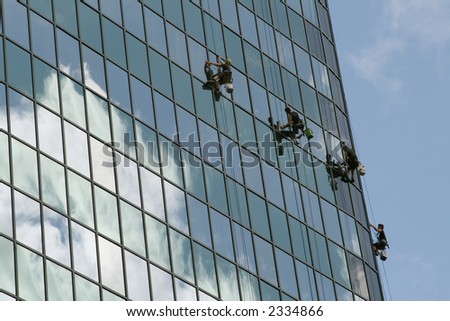 window cleaning team on a buiding