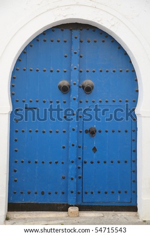 blue arabic door with decorative nails