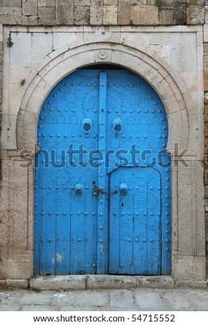 old arabic wooden door in tunisian city
