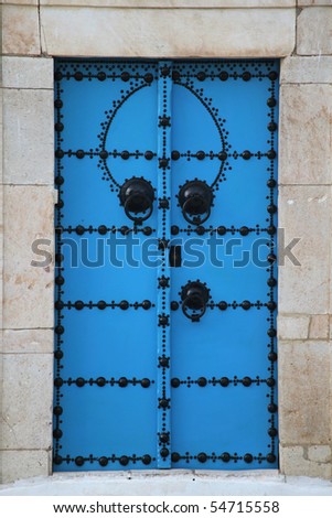 wood and stone door in arabic style
