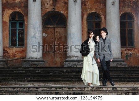 Retro styled fashion portrait of a young couple. Clothing and make-up in 1920's style.