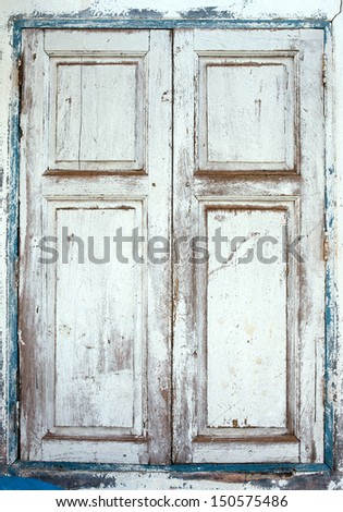 Wooden window shutters - Closed old shuttered weathered