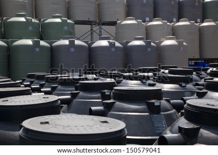 Big plastic container at warehouse. Used for accumulation, storage and transportation of not only technical or drinking water, but also for oils and chemicals.