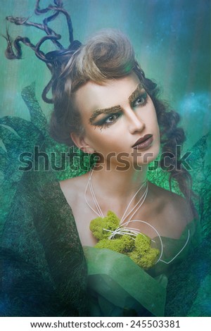Young lady with artistic visage. Fantasy make-up