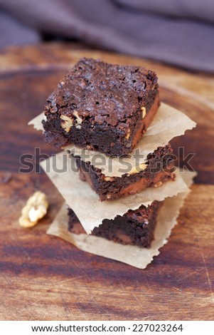 stock-photo-tower-of-delicious-crusty-brownies-on-wood-background-227023264.jpg