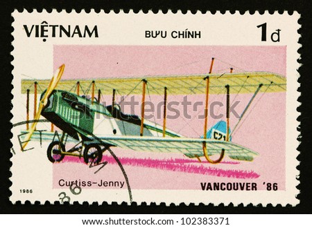 VIETNAM - CIRCA 1986: A stamp printed by VIETNAM shows military aircraft (Curtiss - Jenny ) Crca 1986
