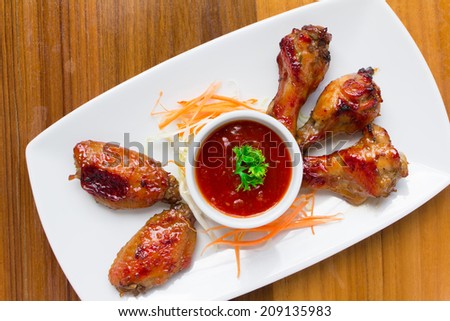 Top view chicken wings on wood table