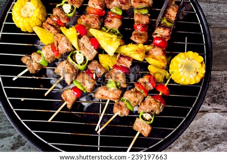 Close up bbq and corncob on a grilling pan, View top