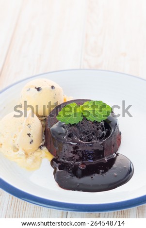 ice cream, chocolate cake with chocolate sauce