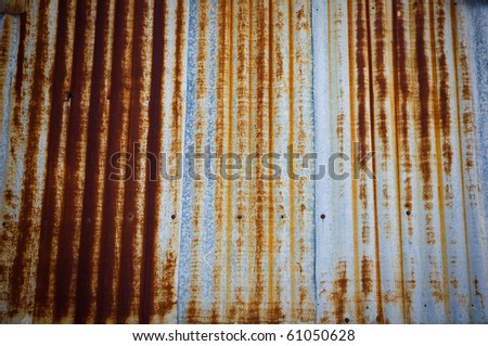 Rusty old corrugated iron fence