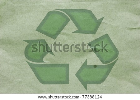 Recycle sign on recycle paper background