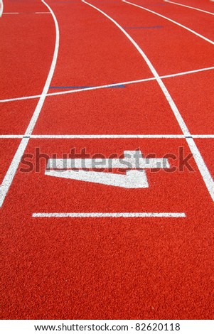 Number 4 on the start of a running track
