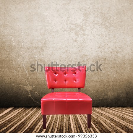 Vintage red armchair on interior room