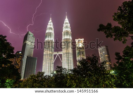 KUALA LUMPUR - FEBRUARY 17: The Petronas Twin Towers are the world's tallest twin towers. The skyscraper height is 451.9m. February 17, 2012, in Kuala Lumpur, Malaysia