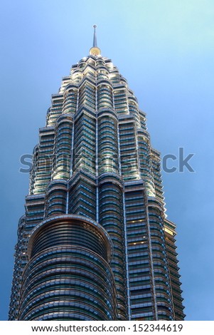KUALA LUMPUR - FEBRUARY 12: The Petronas Twin Towers are the  world's tallest twin towers. The skyscraper height is 451.9m. February 12,  2012, in Kuala Lumpur, Malaysia