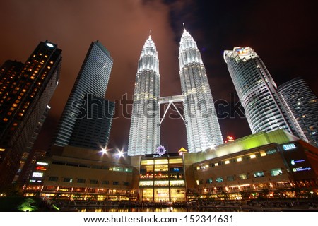 KUALA LUMPUR - FEBRUARY 12: The Petronas Twin Towers are the  world's tallest twin towers. The skyscraper height is 451.9m. February 12,  2012, in Kuala Lumpur, Malaysia