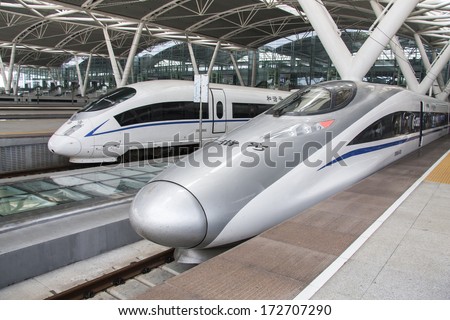 GUANGZHOU, CHINA - April 18: Modern train waits at platform on April 18, 2011 in Guangzhou station, Guangzhou, China. China invests in fast and modern railway, trains with speed over 340 km/h.