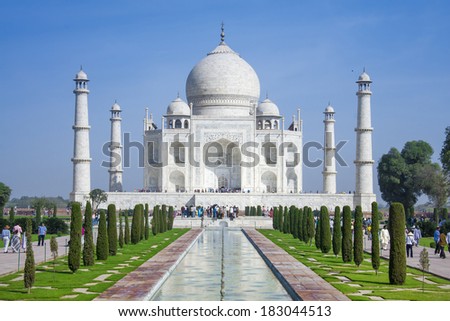 AGRA, INDIA - FEB 23: The people visit Taj Mahal, Agra, India on February 23, 2009. The Taj Mahal is a mausoleum located in Agra, India and is one of the most recognizable structures in the world