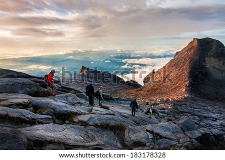 KOTA KINABALU,MALAYSIA -FEB 16:Tourists hike down Mount Kinabalu on February 16, 2012 in Kota Kinabalu,Malaysia. Mount Kinabalu is the highest mountain on the island of Borneo(4,095m).
