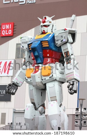 TOKYO, JAPAN - OCTOBER 26: Gundam Mobile Suit Replica on Oct 26,  2013. The 1/1 scale 18m tall statue was built as part of the 30th  anniversary of the Gundam series.