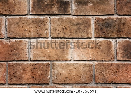 Burnt big brick wall texture pattern background.
