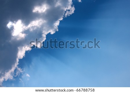 Sunbeam  through the haze on blue sky: can be used as background and dramatic look