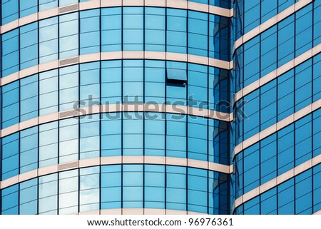 blue mirror glass building, exterior building, some window opened