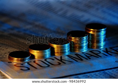 gold coin money with opposite color light, orange and blue