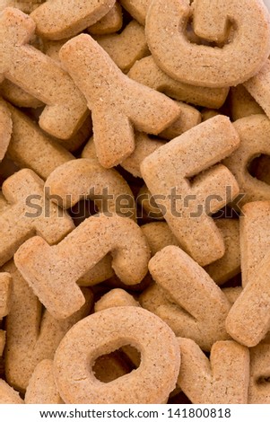 Background texture of alphabet cookies.