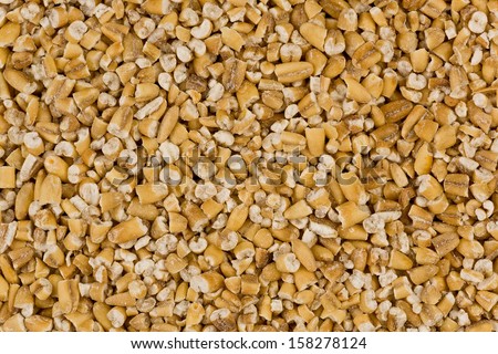 Background texture of steel-cut oats, or irish oats.