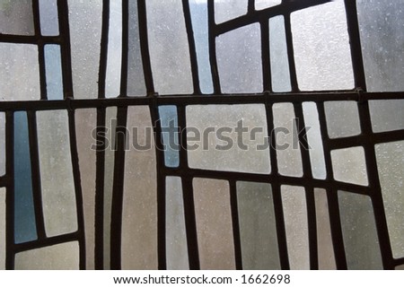 Stained glass in subtle pastel shades. Interesting design background.