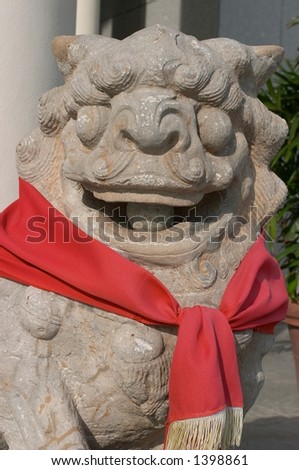 Statue of a Chinese Lion, usually placed at entrances for good luck and ward off evil. Especially found in office buildings. Is considered good Feng Shui, geomancy.