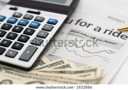 Stock chart analysis, calculator, with pen, vertical orientation. charts, analysis, ups and downs, closeup, cash, shallow depth of field