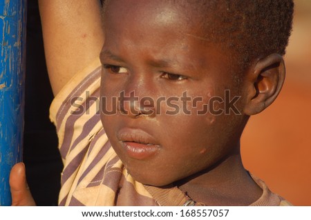POMERINI, TANZANIA, AFRICA - CIRCA AUGUST 2013  - The Franciscan Mission for Humanitarian Aid - The look on the faces of children in Africa, many of them sick with AIDS, a look often without a future