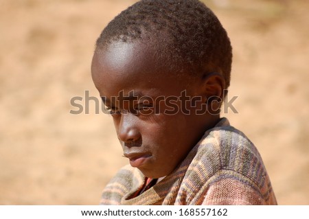 POMERINI, TANZANIA, AFRICA - CIRCA AUGUST 2013  - The Franciscan Mission for Humanitarian Aid - The look on the faces of children in Africa, many of them sick with AIDS, a look often without a future